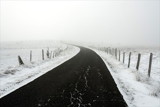 Aubrac plateau. Clear road in winter. Lozere department. Occitanie.France