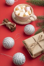 Christmas or New Year composition. Decorations, box, cinnamon, silver balls, fir and spruce