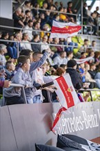 Young football fans cheer with flags in the stands, Mercedes Benz Junior Cup, Glaspalast