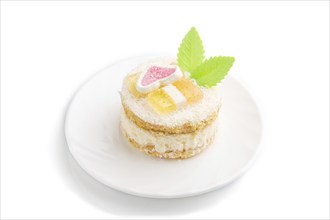 Decorated cake with milk and coconut cream isolated on white background. Side view, close up