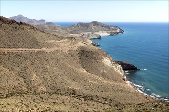 Coastal landscape Cabo de Gata natural park, looking east towards San Jose, Almeria, Spain, Europe