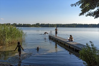 Bathers at the bathing jetty at Schaalsee, Zarrentin, Mecklenburg-Vorpommern, Germany, Europe