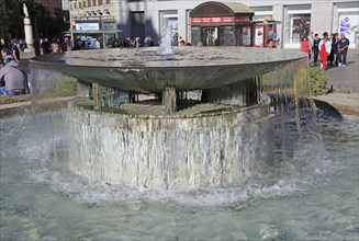 Water fountain in Plaza de la Puerta del Sol, Madrid city centre, Spain, Europe