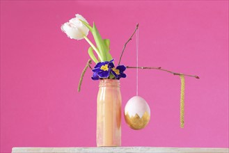 Picturesque still life with flowers and Easter egg, Germany, Europe