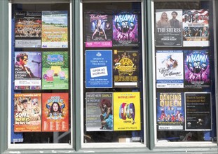 Poster display of forthcoming events and performances, Regent theatre, Ipswich, Suffolk, England,