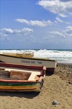 Fishing boats on a pebble beach, surf, Cabo de Gata Natural Park, Las Negras, Almeria, Andalusia,