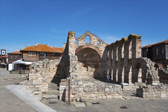 Ruins of an old building with arched windows under a clear sky, Church of St Sophia, Church of St