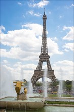 Eiffel Tower, Tour Eiffel, behind a fountain with sculpture, statue Taureau et Daim (Bull and