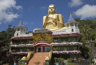 Giant Golden Buddha statue at Dambulla cave temple complex, Sri Lanka, Asia