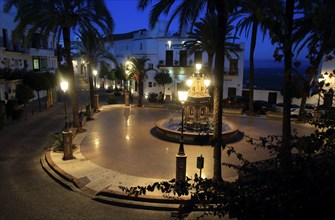 Street lights illuminating Plaza de Espana, Vejer de la Frontera, Cadiz Province, Spain, Europe