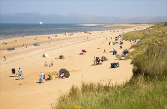 People on a wide sandy beach at Hunstanton, north Norfolk coast, England, United Kingdom, Europe