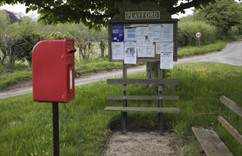 Small rural settlement services comprising of community noticeboard, wooden benches, post box,