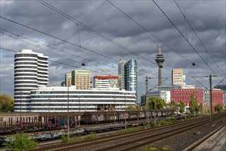 Skyline Düsseldorf Media Harbour, Rhine Tower, S-Bahn station, Düsseldorf-Hamm stop, local train,