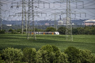 Railway line between Essen and Bochum near Wattenscheid, RRX Rhine-Ruhr Express, regional train,