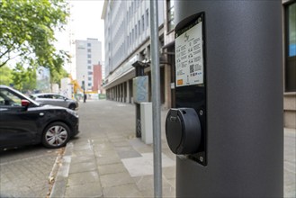 E-charging station in new smart poles, intelligent street lamps, test run, EON and the city of