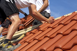 Roofing work, re-roofing of a tiled roof