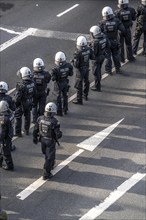 Police officers, police task force, on duty at the demonstration against the AFD party conference