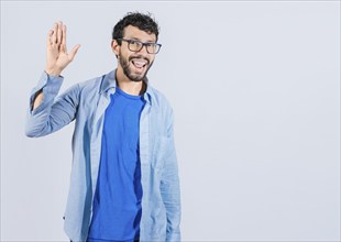 Handsome man gesturing and saying hi isolated. friendly person saying goodbye