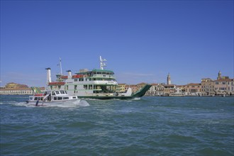 Car ferry and motorboat on the Cannaregio Canal, Venice, Metropolitan City of Venice, Italy, Europe