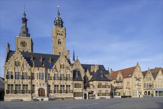 Market square showing town hall with belfy and St Nicholas Church tower, rebuilt after WWI in the