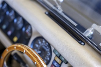 Steering Wheel and Instrument Panel on an Old Classic Car in Switzerland