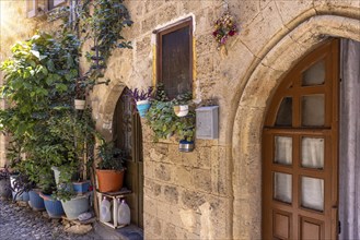 Greece travel destination, colorful streets of Rhodes island city Rhodes in historic city center.