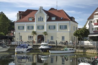 Marina with boats, yachts at the quay and tourist office, leisure harbour, tourist information,