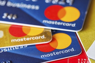 Credit cards from Mastercard to pay as background in Stuttgart, Germany, Europe