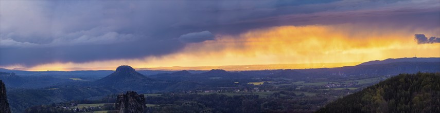 View from the Carolafelsen over Pirna to Dresden. Sunset and rain showers, Bad Schandau, Saxony,