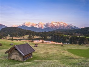 Huts at Geroldsee or Wagenbrüchsee, sunset, Krün near Mittenwald, Karwendel, Werdenfelser Land,