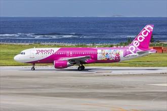 A Peach Airbus A320 aircraft with the registration JA827P in the Soaring Sky Pretty Cure special