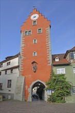 Historic upper gate tower, upper tower, gate tower, red town tower with stepped gable and clock,