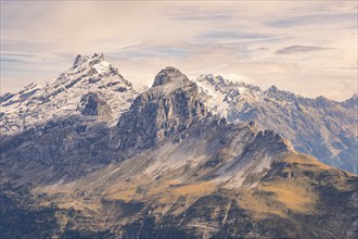 Snowy mountain peaks under a cloudy sky, Planplatten, Switzerland, Europe