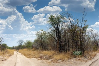 Stone as signpost, orientation, safari, direction, adventure, driving, track, traffic, tour, on the