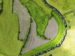 Top Down over Farms and Fields over Cononley and River Aire from a drone, Keighley, North