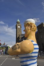 Europe, Germany, Hanseatic City of Hamburg, Jan Fedder Promenade with sailor figure, Glass Tower,