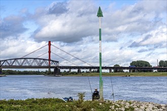 The Beeckerwerth Rhine bridge on the A42 motorway, preceded by the Haus Knipp railway bridge,