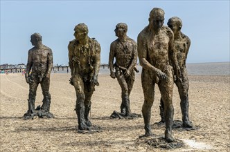 'Walking Men' artwork bronze sculptures by Laurence Edwards, South Beach, Lowestoft, Suffolk,