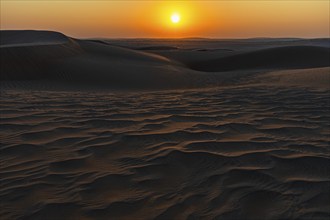 Sunrise in the sand dunes of the Rub al Khali desert, Dhofar province, Arabian Peninsula, Sultanate