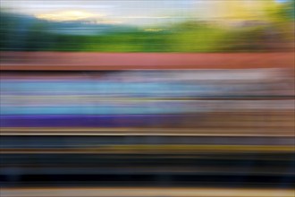 Long exposure from a moving train, Hagen, North Rhine-Westphalia, Germany, Europe