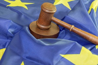 Symbolic image: Judge's gavel on a flag of the European Union