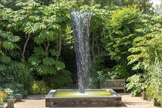 Exotic garden with fountain sculpture by Gile Raynor, East Ruston Old Vicarage garden, East Ruston,