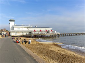 Sandy beach and pier on seafront, Felixstowe, Suffolk, England, UK