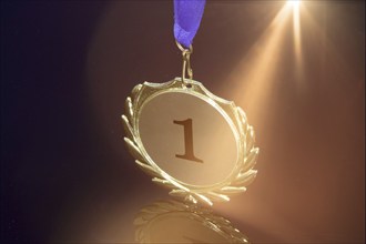 Close-up of a symbolic gold medal