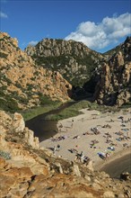 Red rocks and picturesque beach, Spiaggia di Cala li Cossi, Costa Paradiso, Sardinia, Italy, Europe