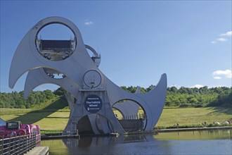 The Falkirk Wheel, a hydraulic structure, moves boats between two canals at different levels, Forth