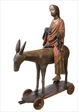 Palm tree donkey, wooden figure from around 1380, painted on a dark background, Hohenzollerisches