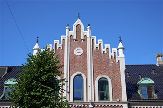 Historic Hanseatic house with striking façade under a clear blue sky, Bryggen, Bergen, Vestland,