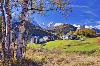 Village view of Tarasp with castle in autumn, Scuol, Canton Graubünden, Switzerland, Europe