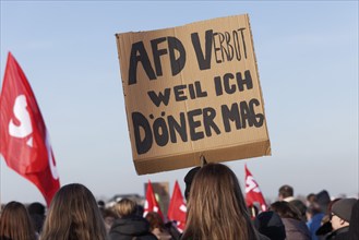 Banner with original text, AfD ban because I like kebabs, large demonstration against right-wing